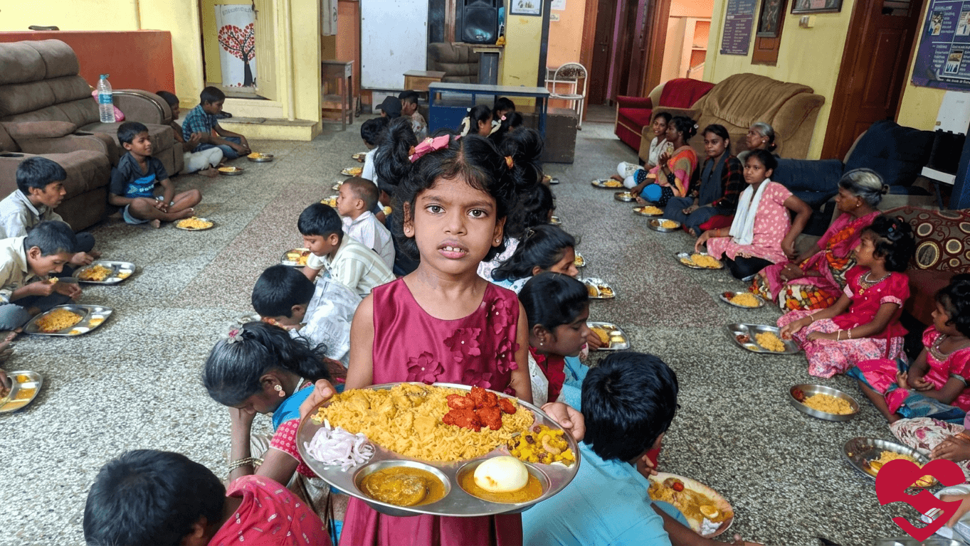 Children and trust members photographed during Anbin Karangal Seva Trust activities